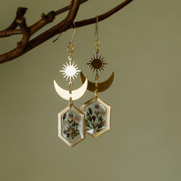 Bitter Dogbane Flowers - Celestial by Astro & Sol - Handcrafted brass earrings featuring delicate wildflower petals in warm golden tones that catch the light with botanical elegance.